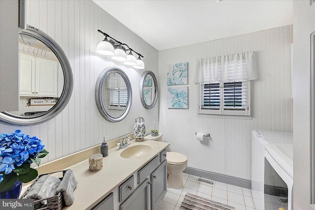 11 Thomas Cir, New Freedom, PA 17349 - full bath with washer and dryer, tile patterned floors, and vanity