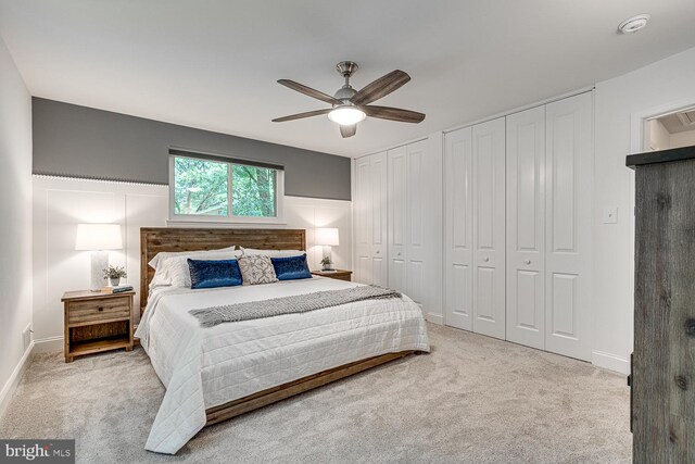 10197 Wavell Rd, Fairfax, VA 22032 - bedroom featuring two closets, carpet, and a ceiling fan