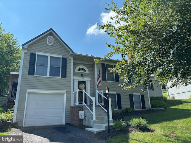 107 Sherris Way, Smithsburg, MD 21783 - split foyer home featuring an attached garage, a front lawn, and driveway