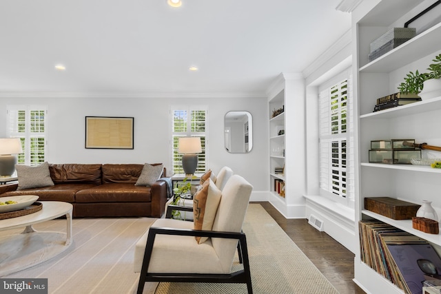 661 Timber Ln, Devon, PA 19333 - living room with ornamental molding, plenty of natural light, recessed lighting, dark wood-style floors, and built in shelves