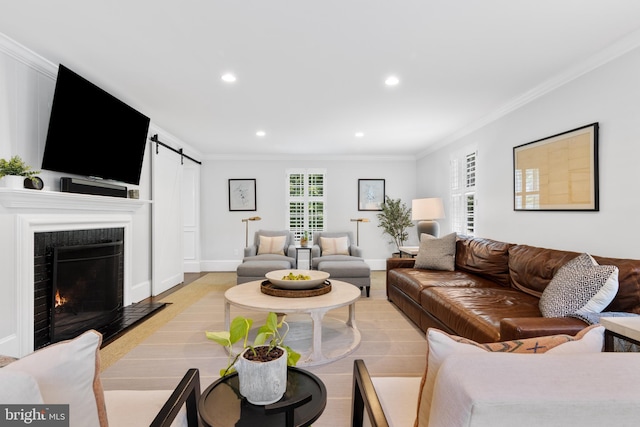 661 Timber Ln, Devon, PA 19333 - living room with a barn door, ornamental molding, recessed lighting, and baseboards