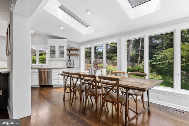 661 Timber Ln, Devon, PA 19333 - dining area featuring a skylight, plenty of natural light, dark wood-type flooring, lofted ceiling, and recessed lighting