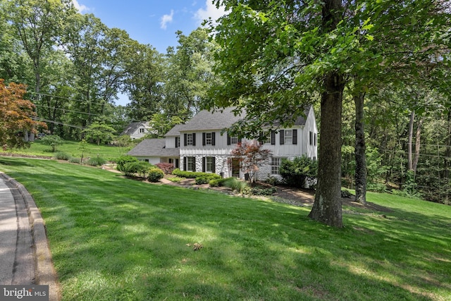 661 Timber Ln, Devon, PA 19333 - view of front of home featuring a front lawn and stone siding