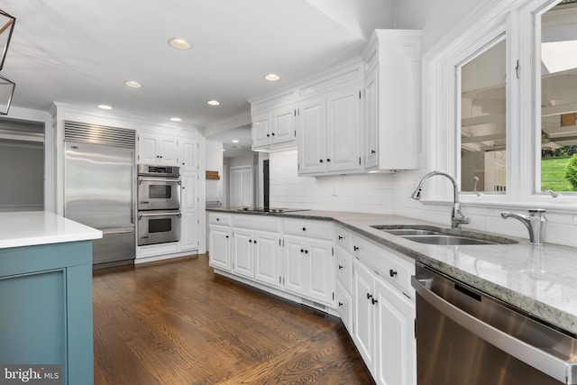 661 Timber Ln, Devon, PA 19333 - kitchen with appliances with stainless steel finishes, a sink, white cabinetry, and recessed lighting