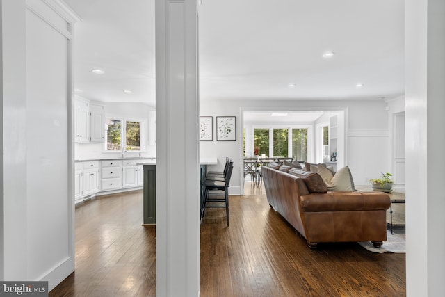661 Timber Ln, Devon, PA 19333 - living room with dark wood-style floors, recessed lighting, and ornate columns