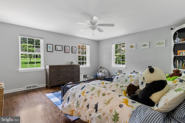661 Timber Ln, Devon, PA 19333 - bedroom with multiple windows, wood finished floors, baseboards, and a ceiling fan