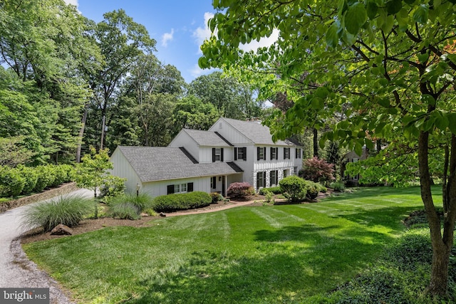 661 Timber Ln, Devon, PA 19333 - view of front of property with a front yard and roof with shingles