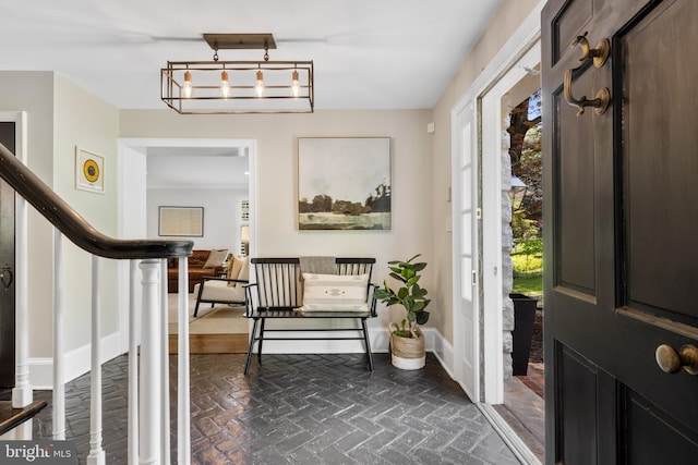 661 Timber Ln, Devon, PA 19333 - foyer entrance featuring stairway, baseboards, and brick patterned flooring