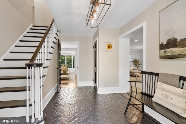661 Timber Ln, Devon, PA 19333 - foyer featuring stairs, brick flooring, baseboards, a chandelier, and recessed lighting