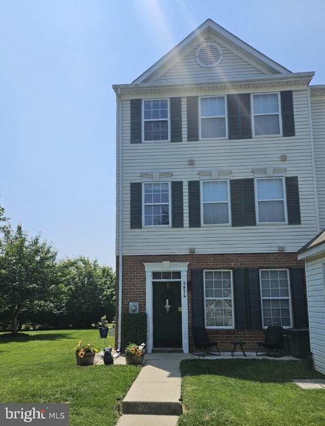 4914 Edgeware Ter, Frederick, MD 21703 - view of front of house with a front lawn and brick siding
