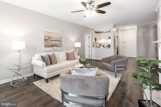 2701 Bellforest Ct Unit 305, Vienna, VA 22180 - living area featuring ceiling fan, dark wood-type flooring, baseboards, and ornamental molding