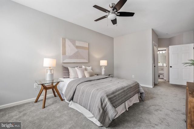 2701 Bellforest Ct Unit 305, Vienna, VA 22180 - carpeted bedroom featuring baseboards, ensuite bathroom, and ceiling fan