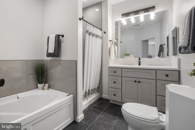 2701 Bellforest Ct Unit 305, Vienna, VA 22180 - bathroom with marble finish floors, a shower stall, a garden tub, vanity, and toilet