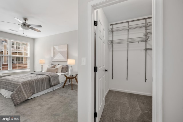 2701 Bellforest Ct Unit 305, Vienna, VA 22180 - bedroom featuring light carpet, a closet, ceiling fan, and baseboards