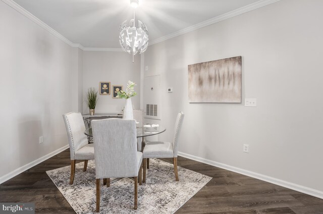 2701 Bellforest Ct Unit 305, Vienna, VA 22180 - dining area featuring a chandelier, crown molding, baseboards, and wood finished floors