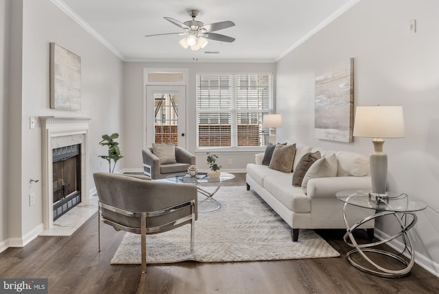 2701 Bellforest Ct Unit 305, Vienna, VA 22180 - living area with ceiling fan, wood finished floors, a fireplace, crown molding, and baseboards