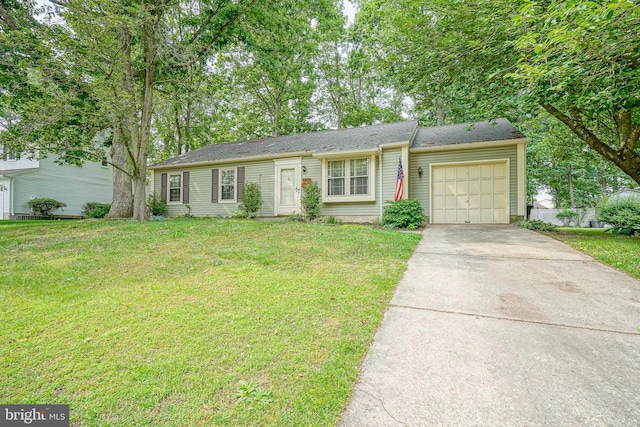 1035 S Beecham Rd, Williamstown, NJ 08094 - view of front facade with a garage, concrete driveway, and a front yard
