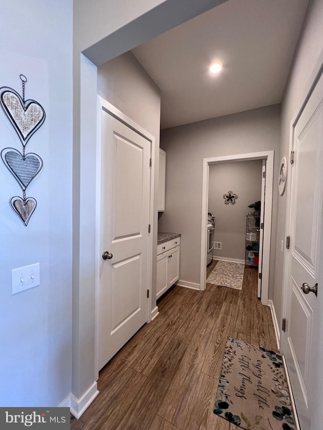 1143 Kayla Ln, Townsend, DE 19734 - corridor with dark wood finished floors and baseboards