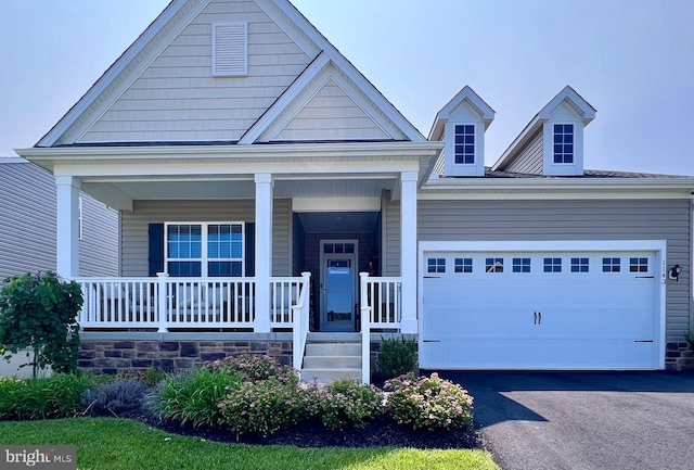 1143 Kayla Ln, Townsend, DE 19734 - view of front of property with a porch, an attached garage, and driveway