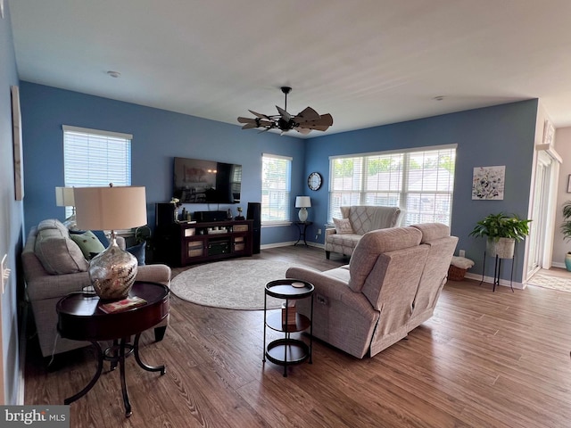 1143 Kayla Ln, Townsend, DE 19734 - living room with wood finished floors, baseboards, and ceiling fan