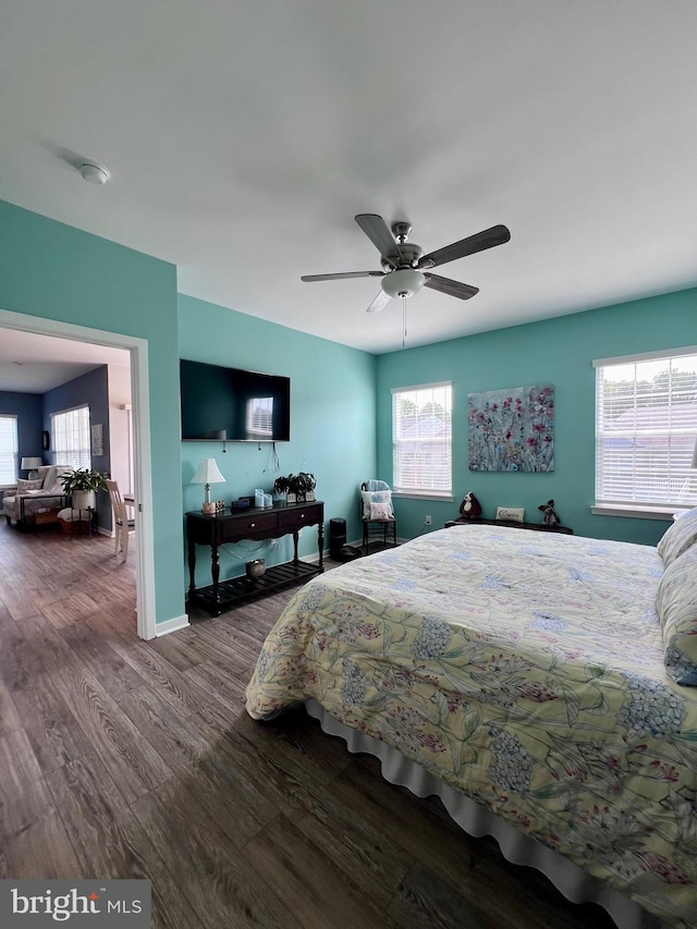 1143 Kayla Ln, Townsend, DE 19734 - bedroom with wood finished floors, ceiling fan, and baseboards