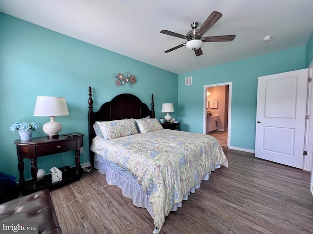 1143 Kayla Ln, Townsend, DE 19734 - bedroom with wood finished floors, baseboards, a ceiling fan, and ensuite bathroom