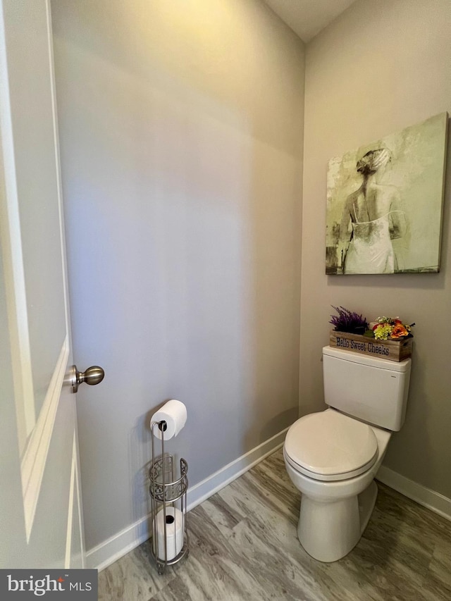 1143 Kayla Ln, Townsend, DE 19734 - bathroom with wood finished floors, baseboards, and toilet