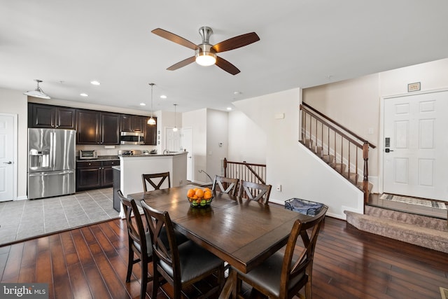 45711 Winding Branch Ter, Sterling, VA 20166 - dining space with hardwood / wood-style floors, a ceiling fan, recessed lighting, stairway, and baseboards