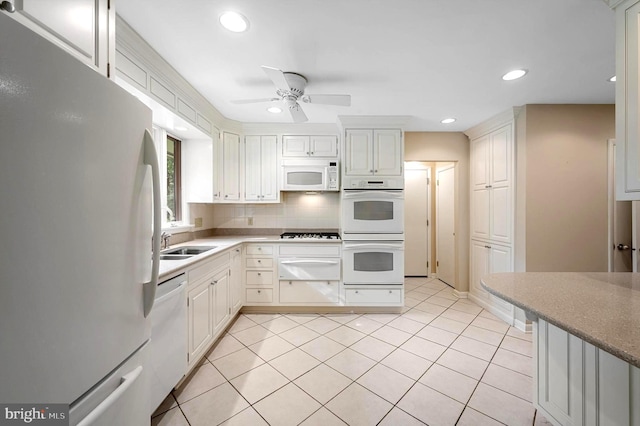 516 Merrimans Ln, Winchester, VA 22601 - kitchen with white appliances, ceiling fan, a warming drawer, recessed lighting, and decorative backsplash