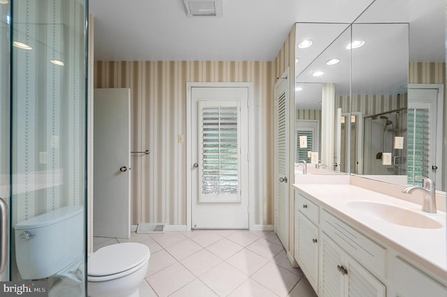 516 Merrimans Ln, Winchester, VA 22601 - full bath with wallpapered walls, vanity, tile patterned floors, recessed lighting, and a shower with door