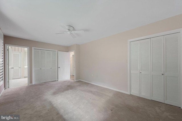 516 Merrimans Ln, Winchester, VA 22601 - unfurnished bedroom with carpet, multiple closets, and ceiling fan