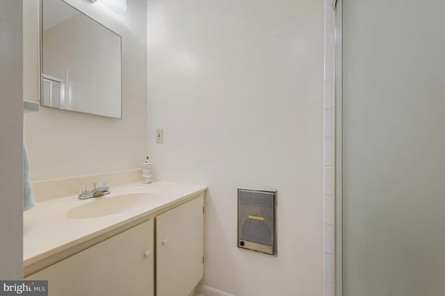 516 Merrimans Ln, Winchester, VA 22601 - bathroom with vanity, heating unit, and a shower with shower door