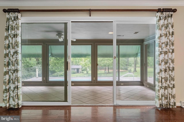 516 Merrimans Ln, Winchester, VA 22601 - doorway to outside featuring healthy amount of natural light, a ceiling fan, wood finished floors, and ornamental molding