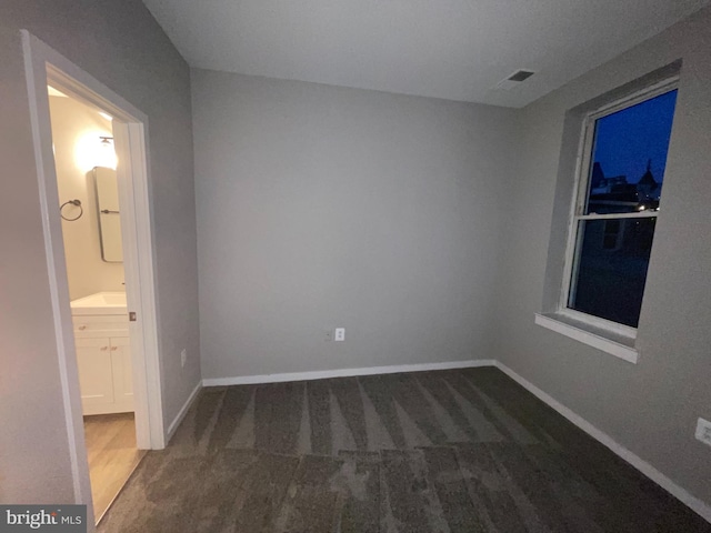 1742 U St NW Unit 203, Washington, DC 20009 - unfurnished bedroom featuring carpet and baseboards