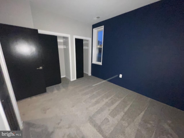 1742 U St NW Unit 203, Washington, DC 20009 - unfurnished bedroom featuring carpet floors