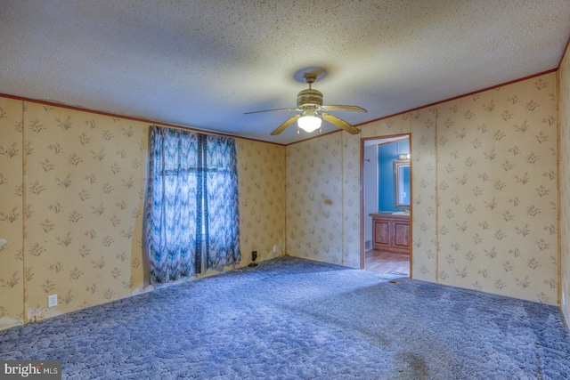 32588 Captains Way, Millsboro, DE 19966 - carpeted empty room with ceiling fan, a textured ceiling, ornamental molding, and wallpapered walls