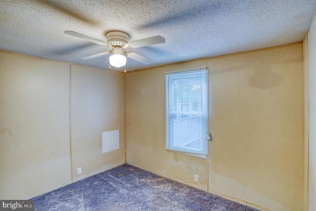 32588 Captains Way, Millsboro, DE 19966 - unfurnished room with plenty of natural light, carpet floors, ceiling fan, and a textured ceiling