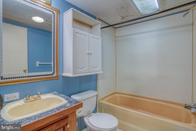 32588 Captains Way, Millsboro, DE 19966 - bathroom featuring a textured ceiling, toilet, vanity, and bathtub / shower combination