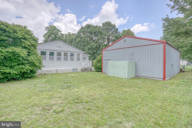 32588 Captains Way, Millsboro, DE 19966 - view of green lawn with an outbuilding, an outdoor structure, and a garage