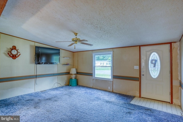 32588 Captains Way, Millsboro, DE 19966 - foyer featuring carpet floors, ceiling fan, a textured ceiling, and lofted ceiling