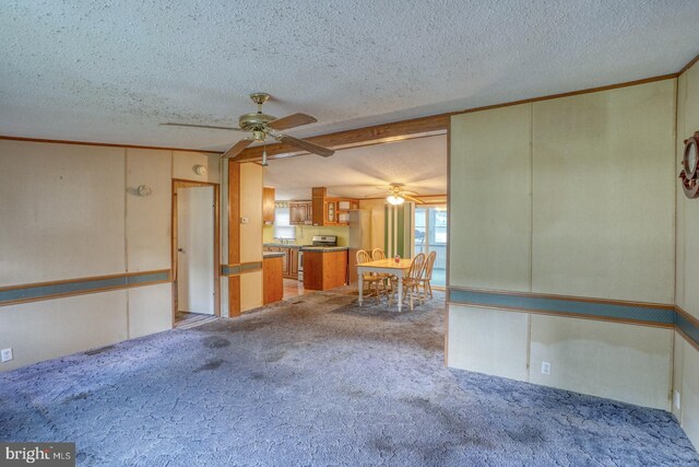 32588 Captains Way, Millsboro, DE 19966 - kitchen featuring a ceiling fan, gas range, light carpet, a textured ceiling, and brown cabinets