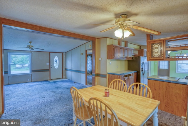 32588 Captains Way, Millsboro, DE 19966 - dining area featuring a ceiling fan, a textured ceiling, light carpet, and beam ceiling