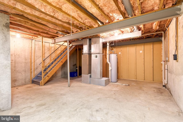 8798 Victory Ct, Walkersville, MD 21793 - unfinished below grade area with water heater, stairs, and heating unit