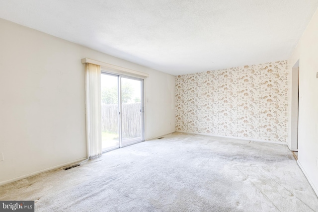 8798 Victory Ct, Walkersville, MD 21793 - unfurnished room with carpet floors and wallpapered walls