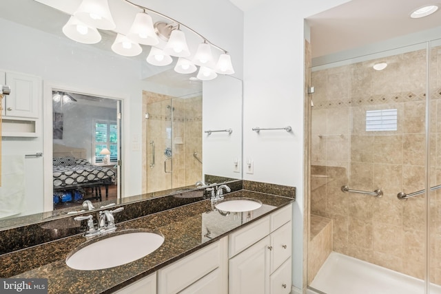 36769 E Pebble Beach Dr, Frankford, DE 19945 - full bathroom featuring ensuite bath, a shower stall, and double vanity