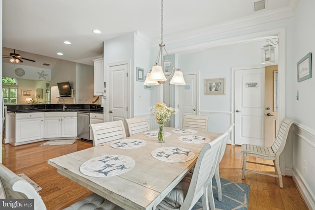 36769 E Pebble Beach Dr, Frankford, DE 19945 - dining space with light wood-style flooring, ceiling fan, crown molding, and recessed lighting