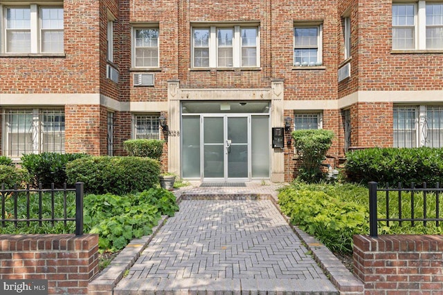 3028 Wisconsin Ave NW Unit 402, Washington, DC 20016 - doorway to property featuring brick siding