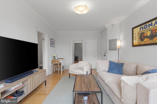 3028 Wisconsin Ave NW Unit 402, Washington, DC 20016 - living room featuring crown molding, light wood-style floors, and electric panel