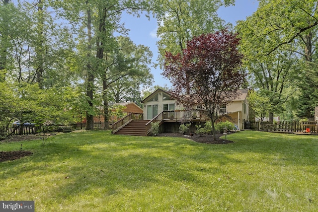 10702 Orchard St, Fairfax, VA 22030 - fenced backyard with a deck and stairs