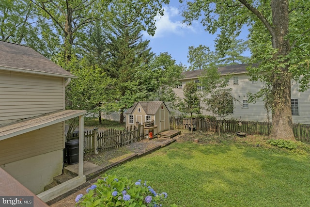 10702 Orchard St, Fairfax, VA 22030 - fenced backyard with a storage unit